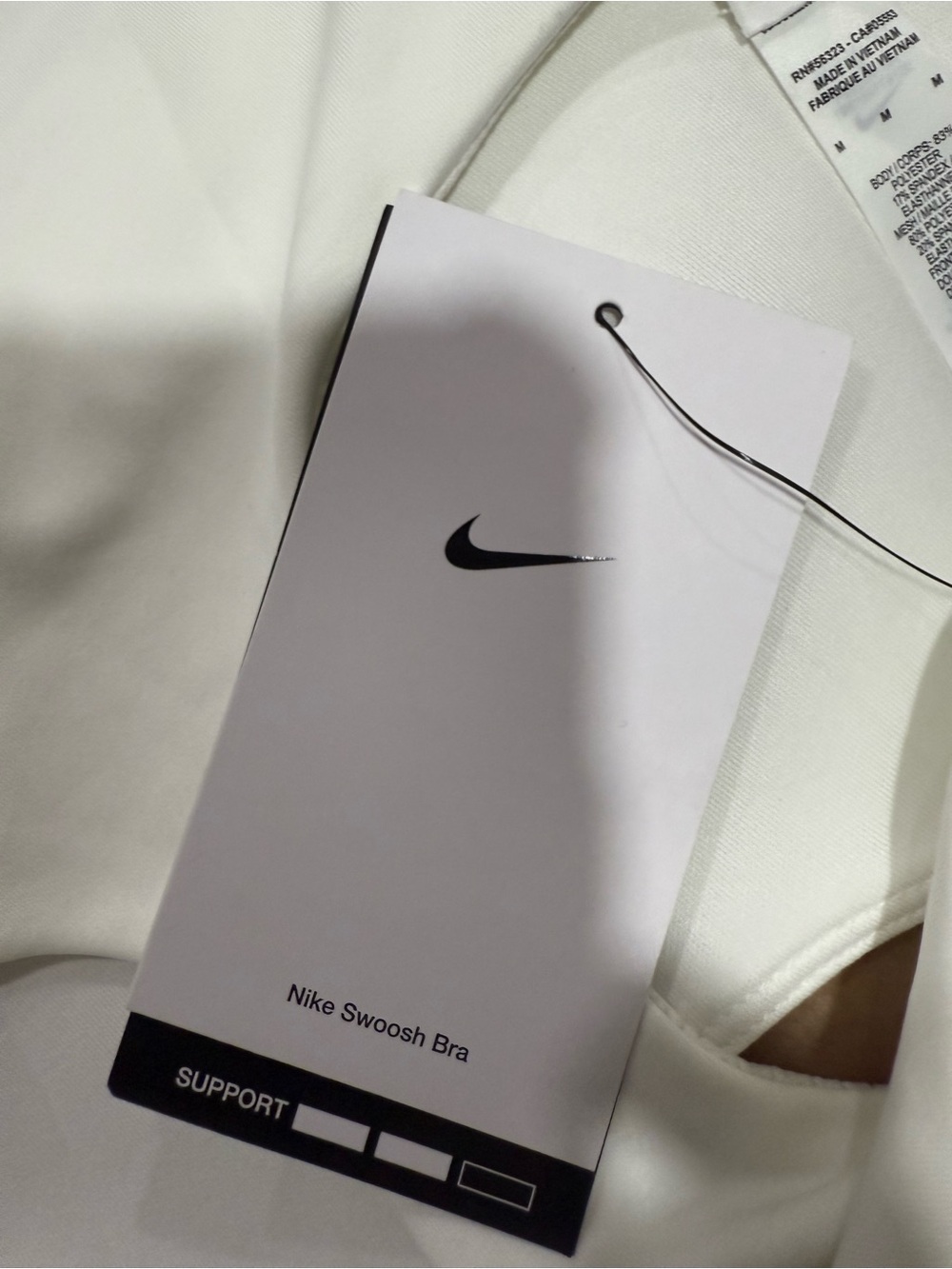 Nike White Sports Bra with Black Swoosh Tag - Picture 4 of 4